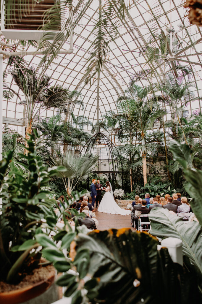 franklin park conservatory wedding ceremony in the palm house